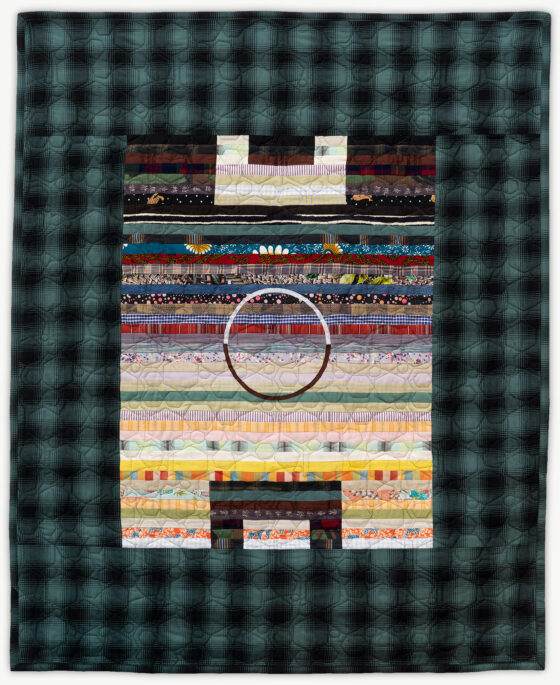 'Milo's Graduation', a special occasion quilt designed by Lori Mason